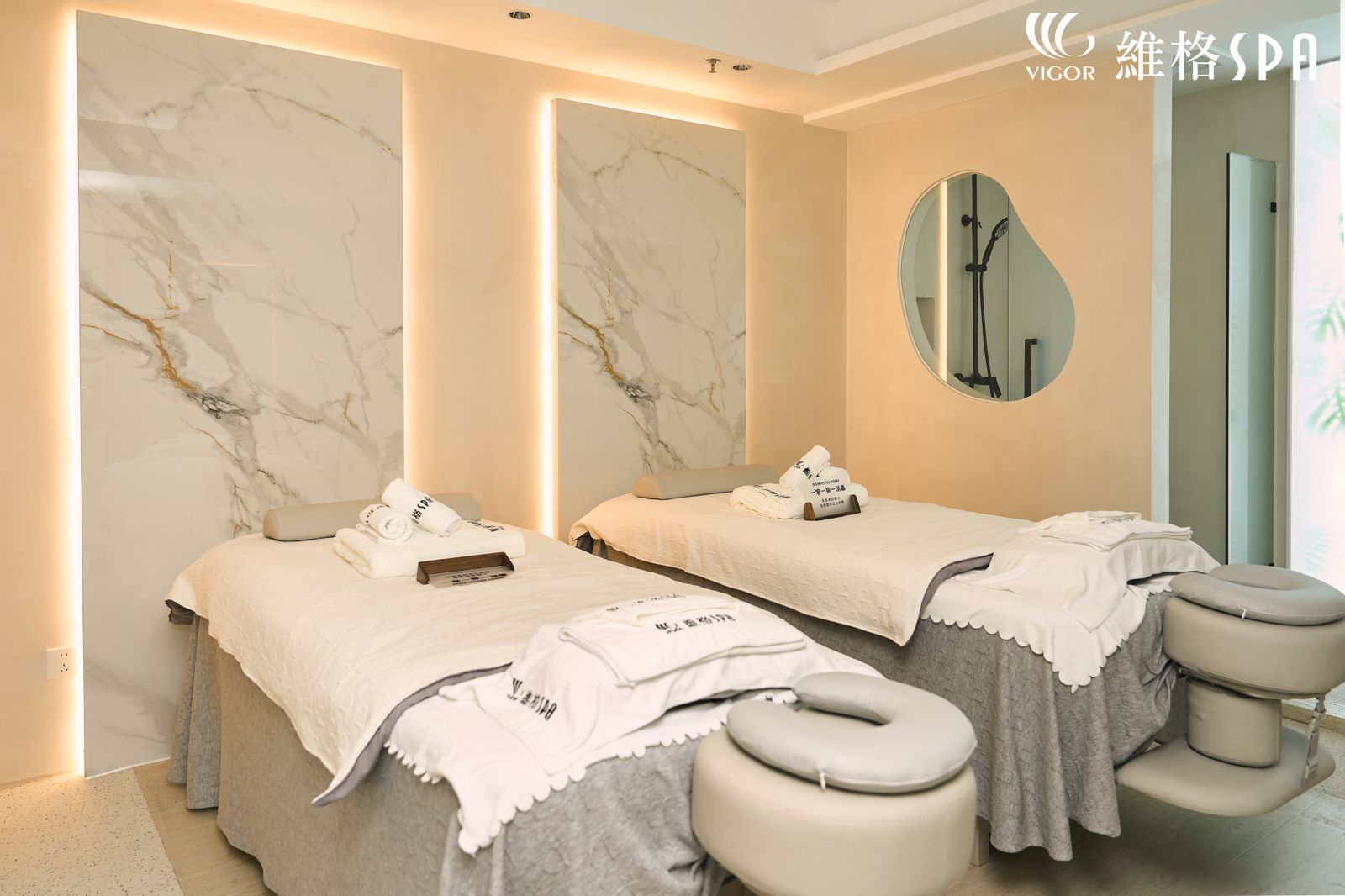 Modern minimalist treatment room with backlit panels
